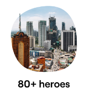 Skyline view of Manila, showcasing a mix of modern high-rise buildings and city streets bustling with activity
